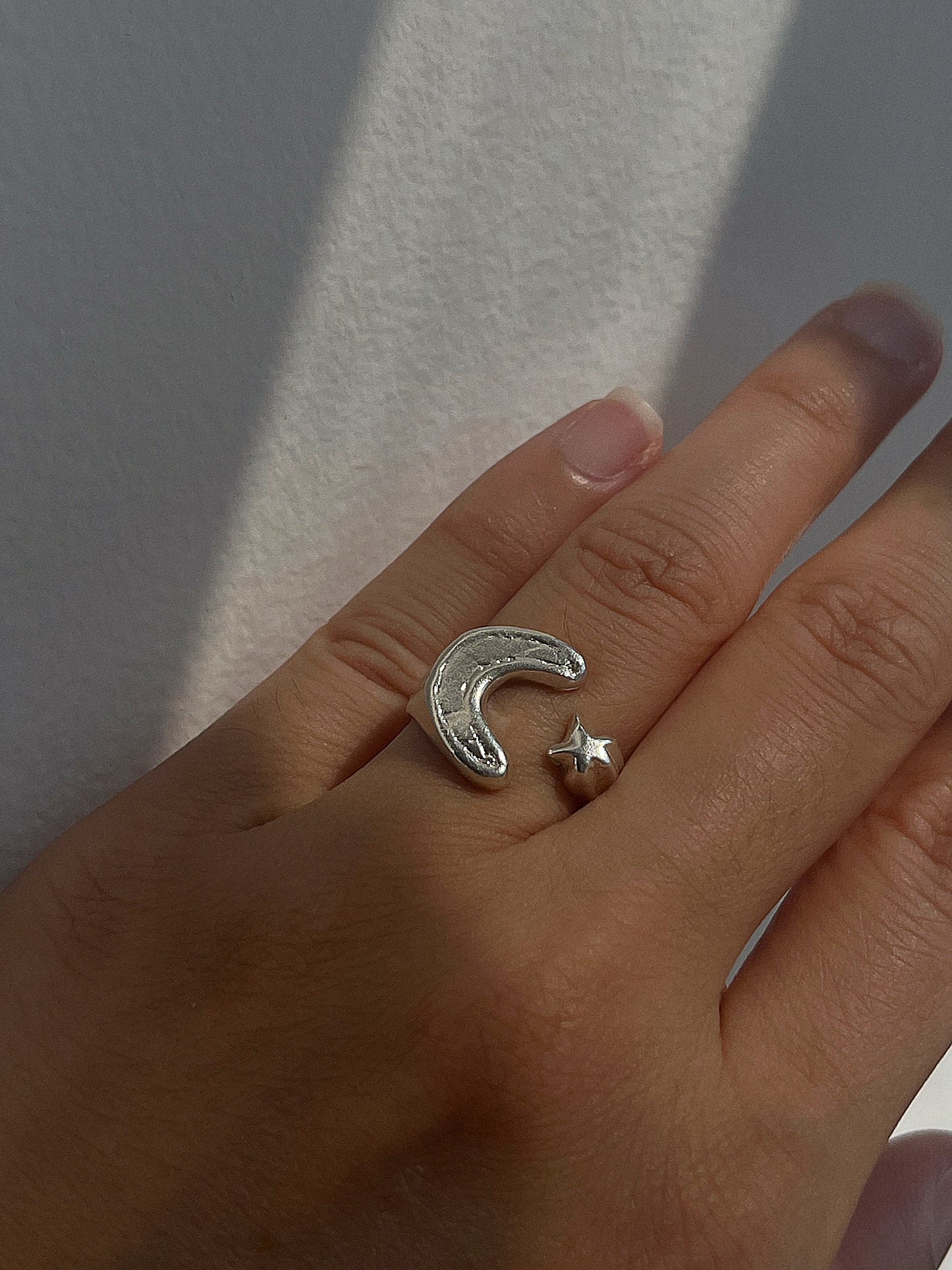 AND THE STARS, AND THE MOON RING