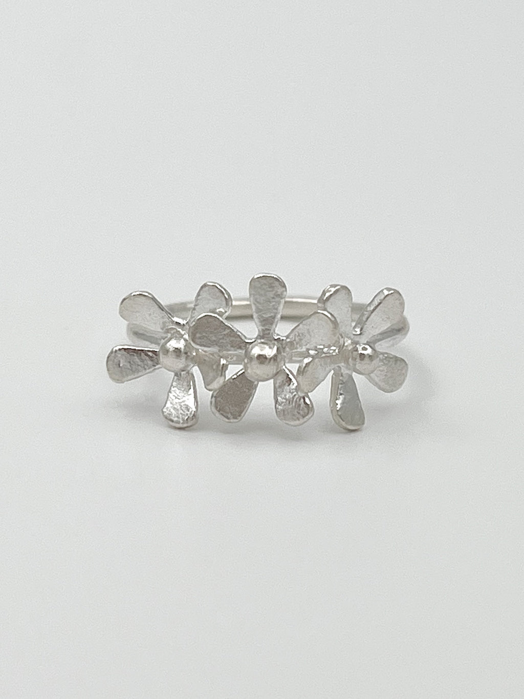 THE FLOWERS SHE SENT PINKY RING