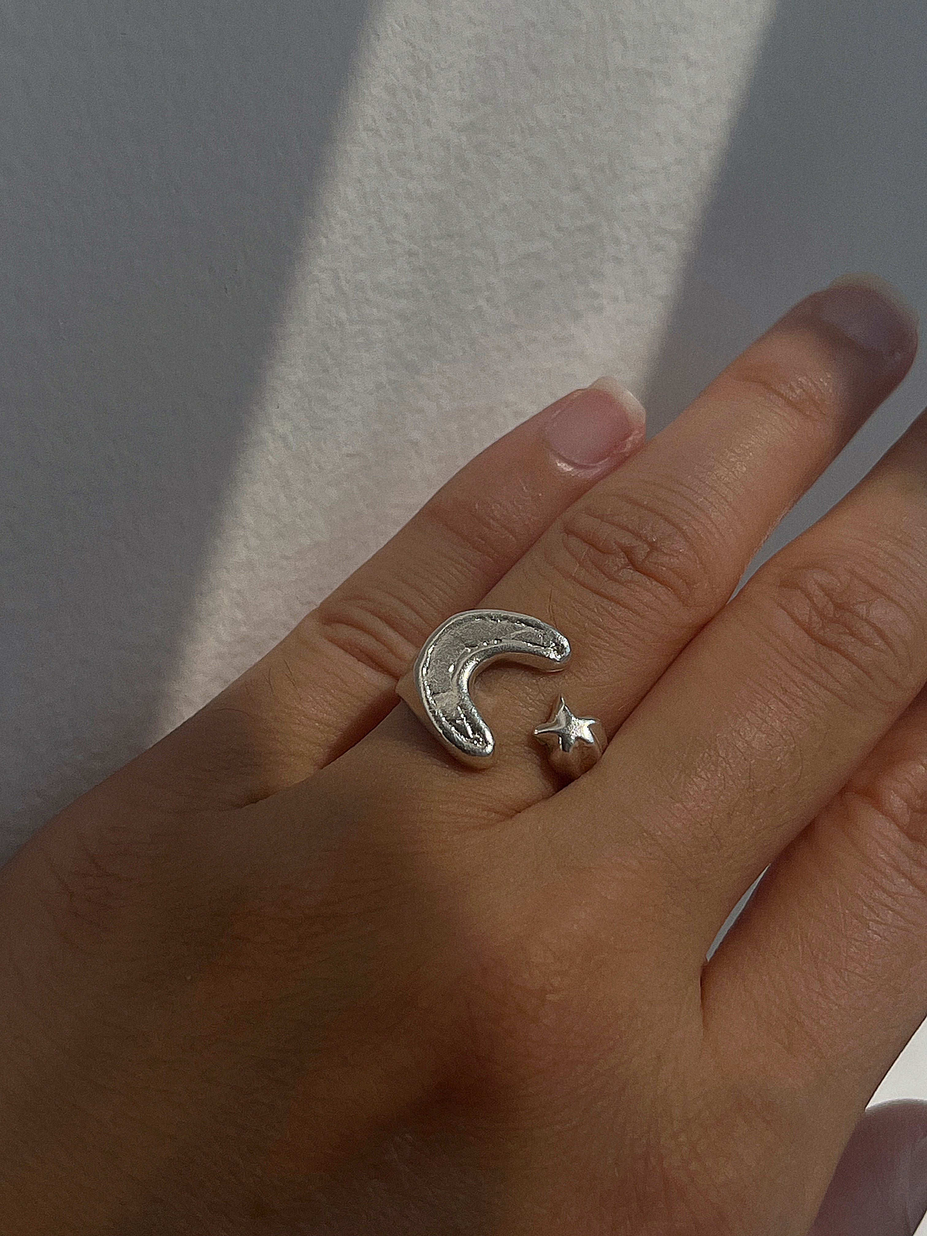 AND THE STARS, AND THE MOON RING