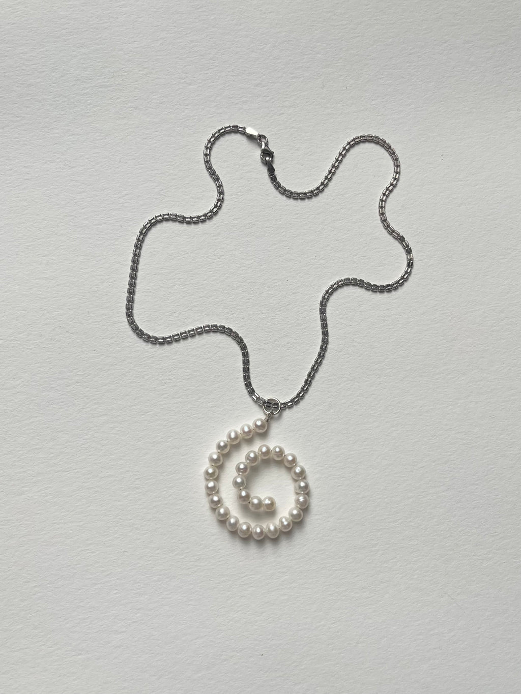 GLOBAL HEAT WAVE PEARL NECKLACE