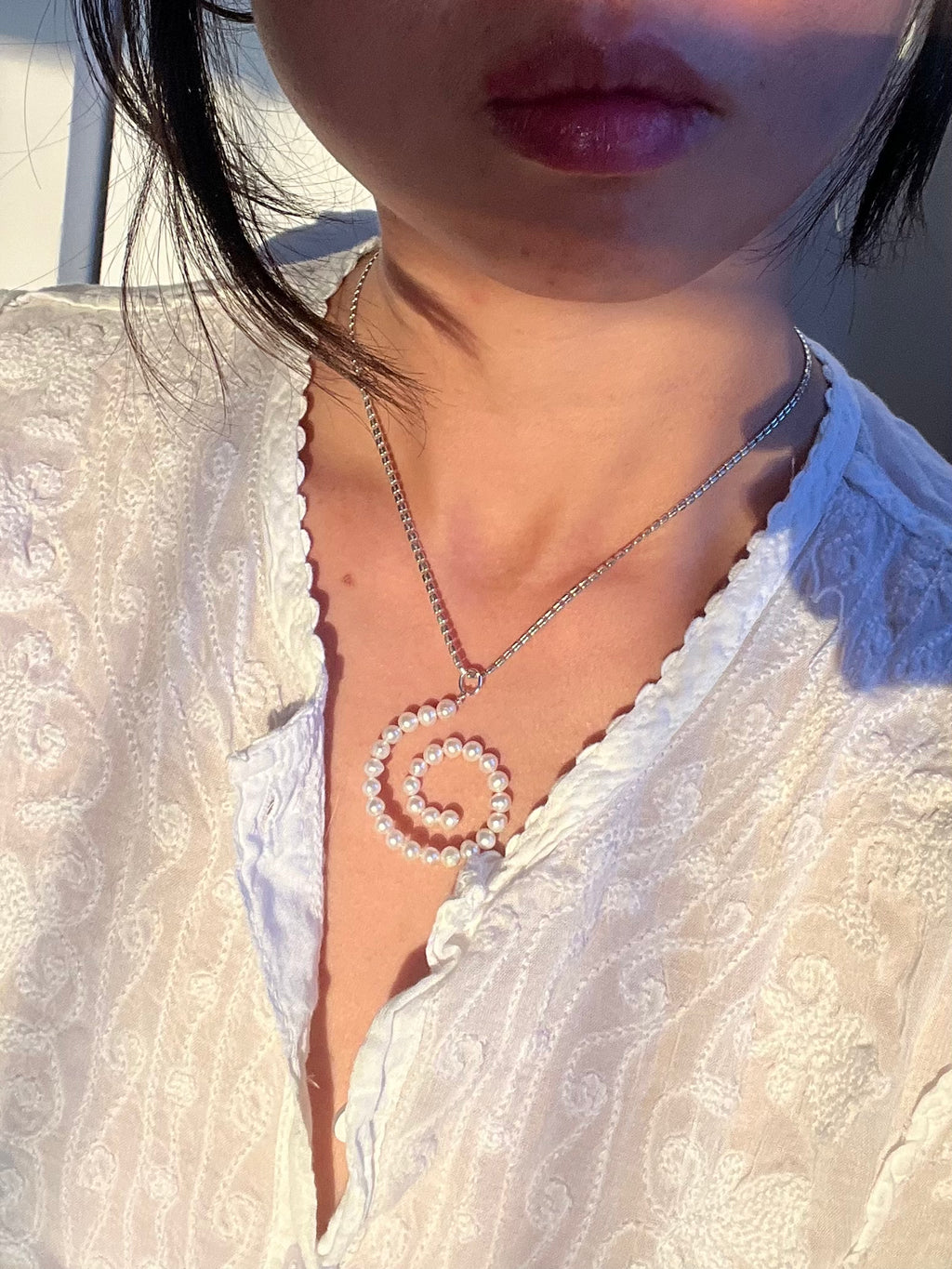 GLOBAL HEAT WAVE PEARL NECKLACE