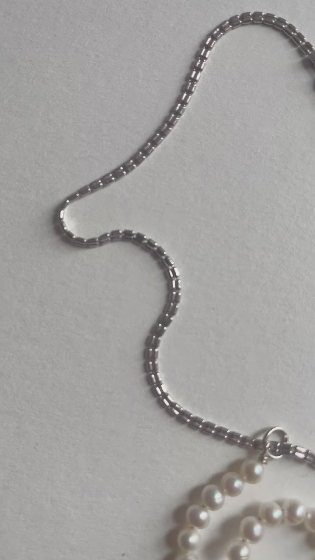 GLOBAL HEAT WAVE PEARL NECKLACE